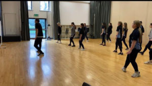 The Dance Department at Mascalls Academy are shown rehearsing a dance sequence for an annual show.