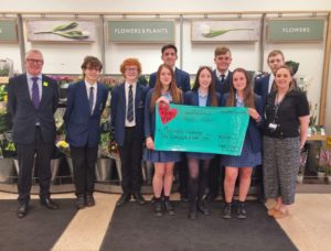 Studens stood with adults at Waitrose