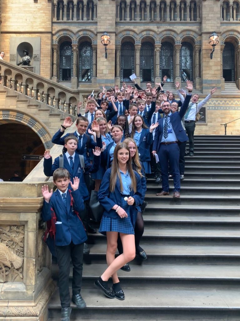 Mascalls students on the stairs in the Natural History Museum
