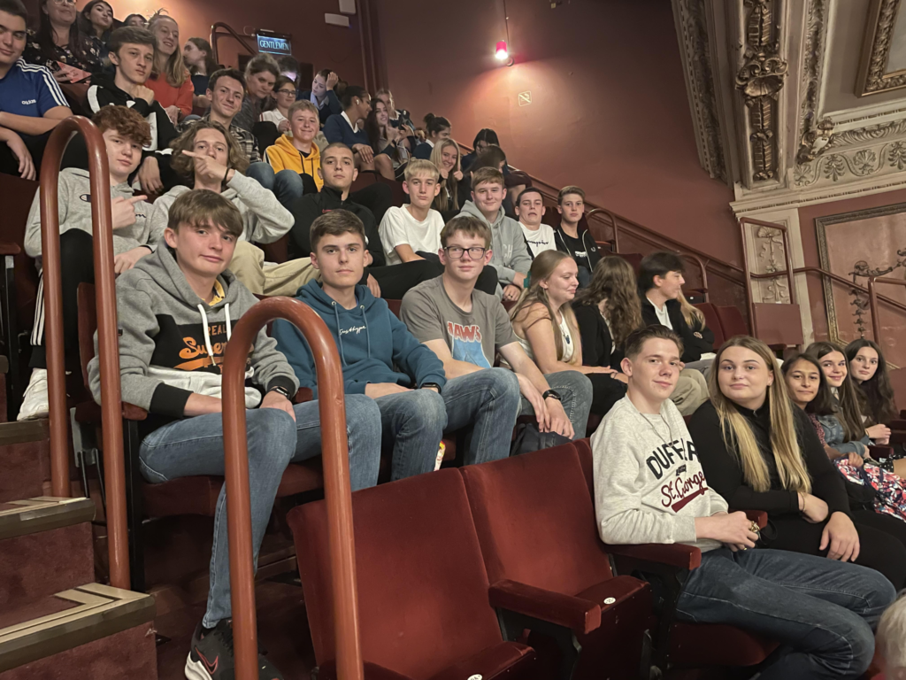 Mascalls Academy students are seen sitting in the audience, watching a performance of 'An Inspector Calls' at Wimbledon in London.