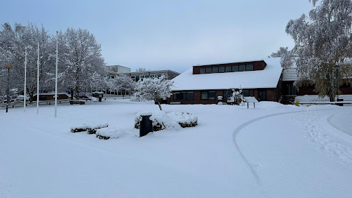 An external photo of the Mascalls Academy building covered in snow in December 2022.